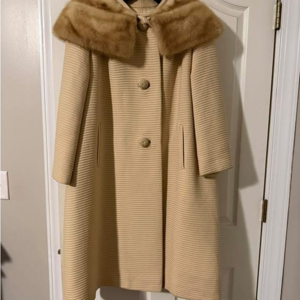 Vintage coat with fur collar.